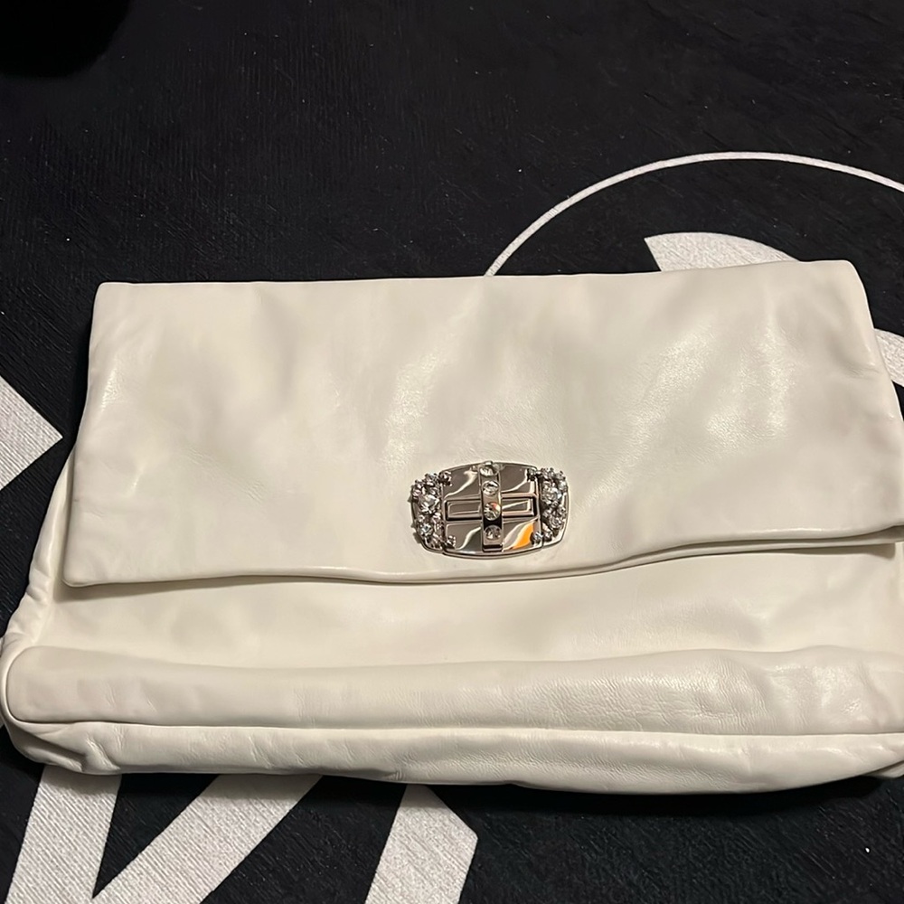 Miu Miu white leather clutch bag.